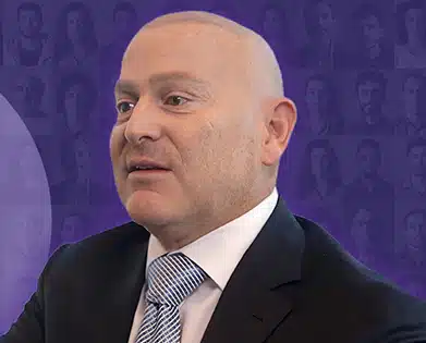 jeff astrow headshot purple background