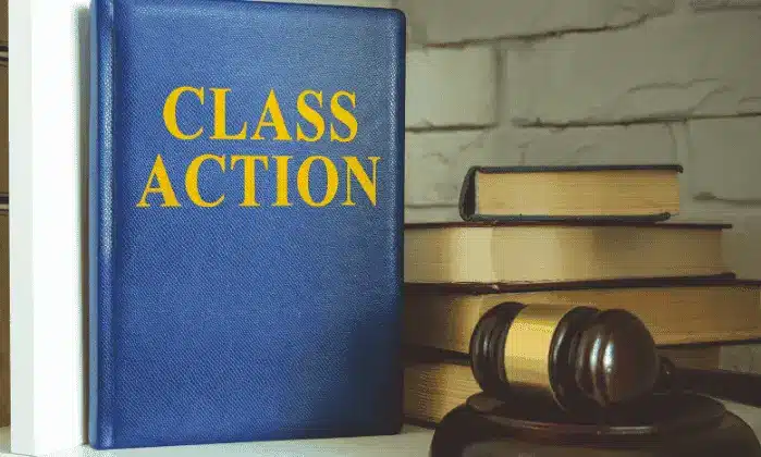 classa ction blue book with gavel