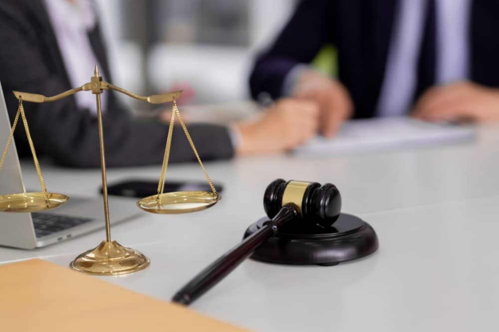 Gavel and scales of justice on a table