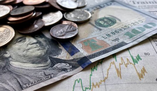 money-finances-hundred-dollar-bill-with-coins-o-2026-01-07-05-59-39-utc